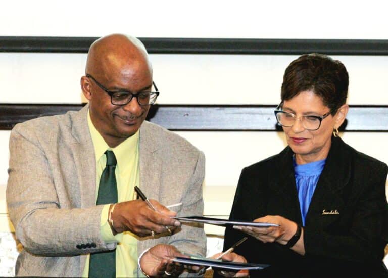 Senior Corporate Director At Sandal Corporate University Dr Luz Longsworth And Dr Francis Severin Principal Of Uwi Global Campus